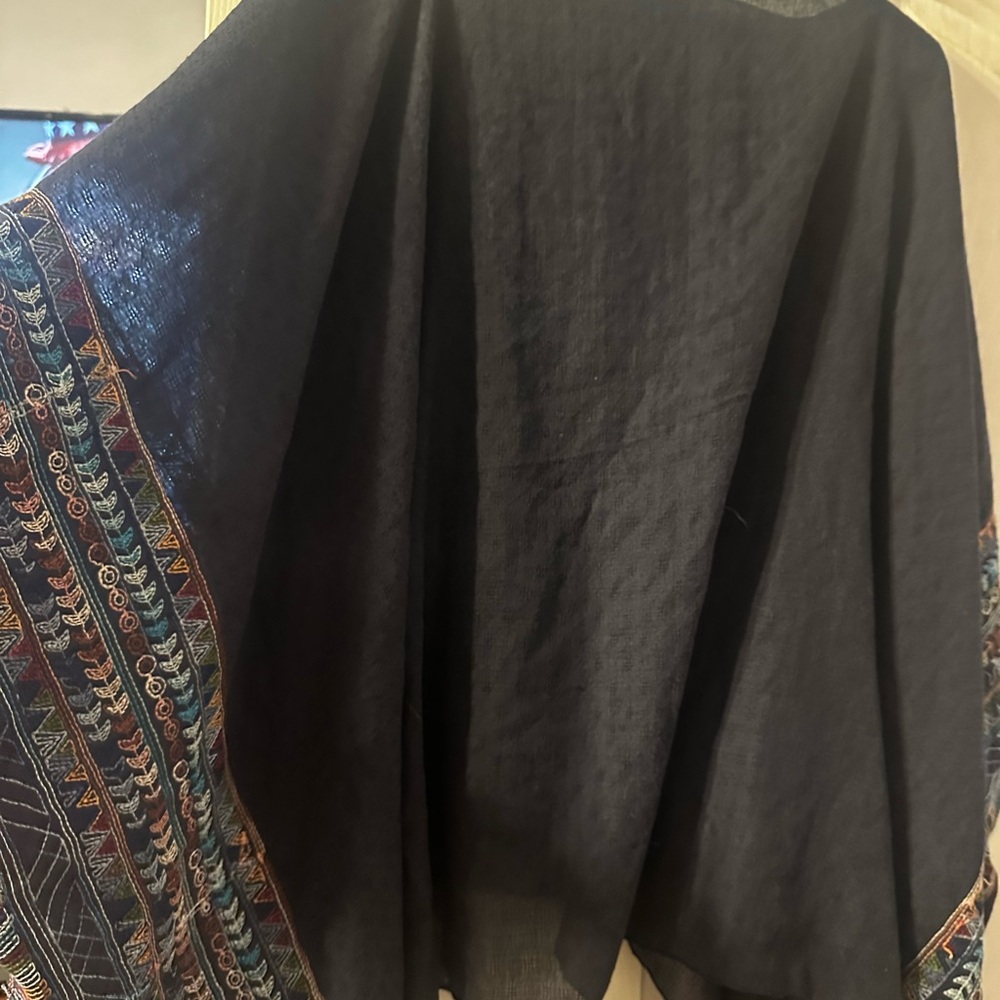Navy poncho with stitched details